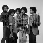 03-02-1979 Jackson 5, Michael, Jermaine, Marlon, Jackie and Tito Jackson at studio in Amsterdam, The Netherlands. 

[keywords]Black & White Image, Posed[/keywords]